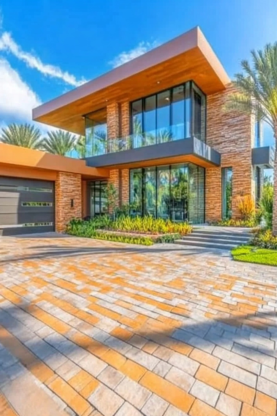 Contemporary Edge with a Colorful Brick Driveway